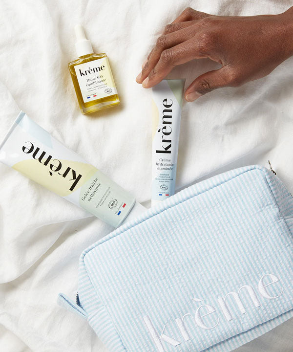 Trousse de toilette bleu ciel rayée