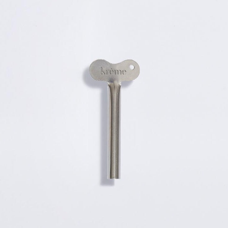 Presse tube zéro gachis à enrouler sur une crème